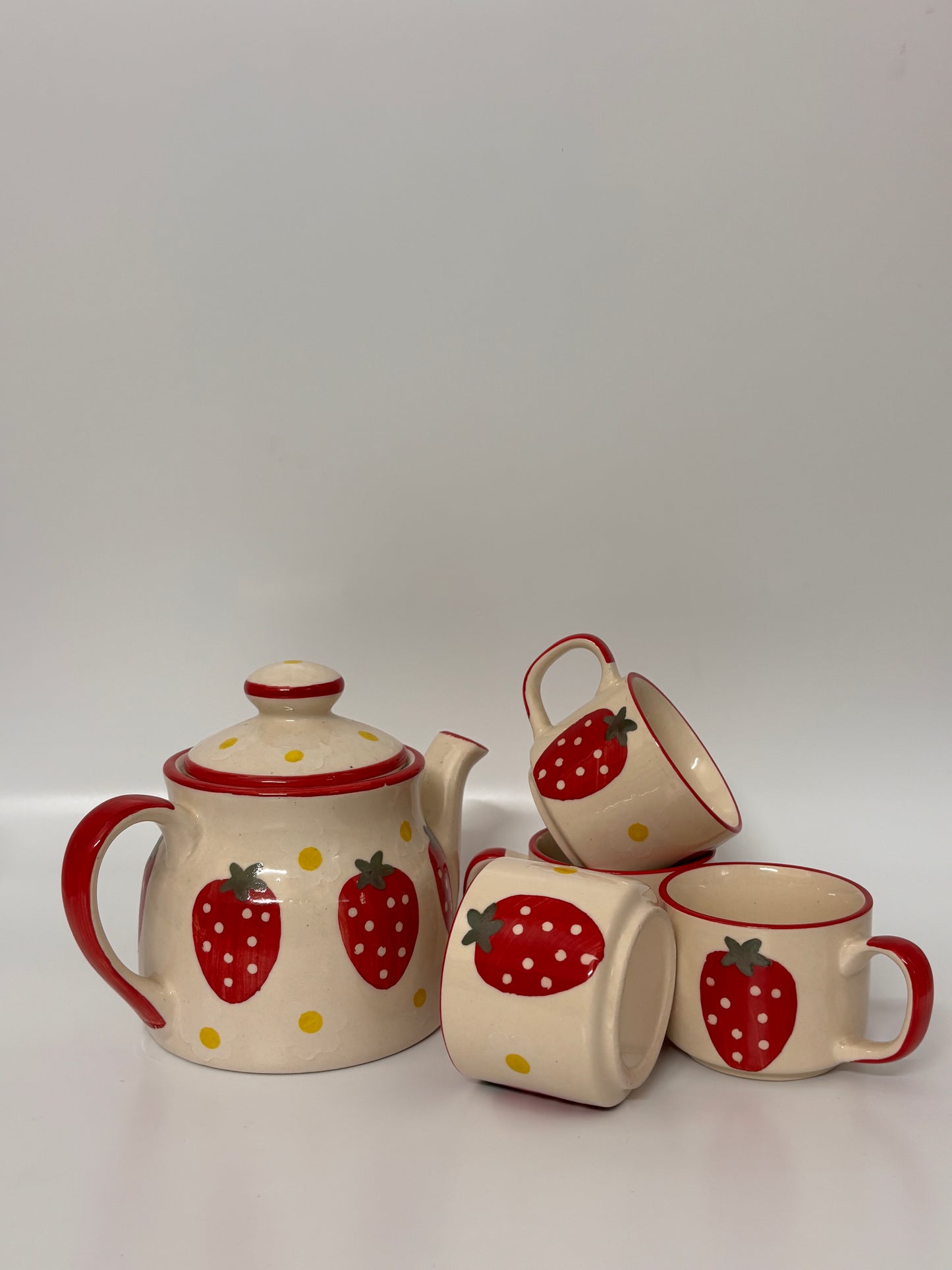 Hand-Painted Strawberry 
Morning Tea Set – Ceramic Kettle, 4 Cups & Wooden Tray